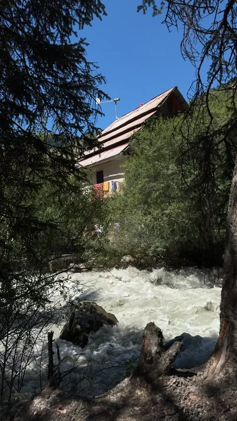 Mountain river and house in Jeti-Oguz gorge, 4K vertical Stock Footage 342029198