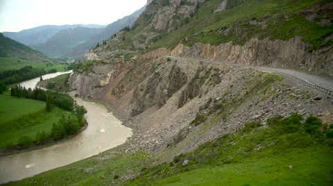 Mountain river and road Stock Footage 64144699