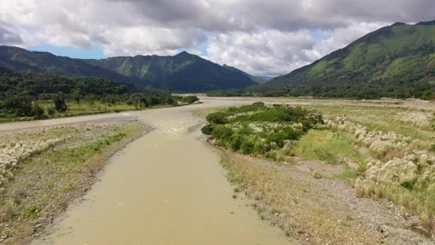Mountain river and sky with cumulus clouds, top view. The nature of Luzon Stock Footage 343333553