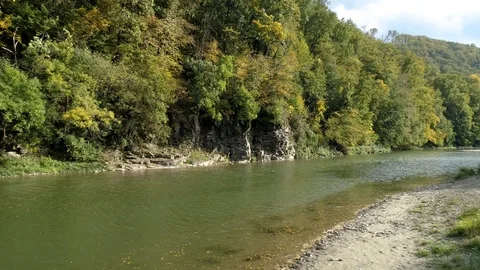 Mountain river and stone rock among the autumn forest. Stock Footage 116991518