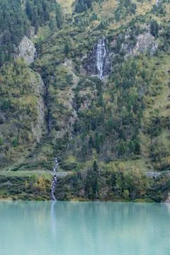Mountain river and trees landscape. Kaunertaler Gletscher natural environment Stock Photos