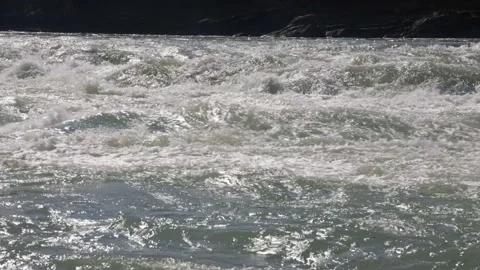 Mountain river with arge slope and speed flow, shallow depth and frequent rapids Stock Footage 205564397