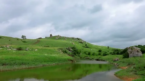 Mountain river in the background of green hills Stock Footage 11144161