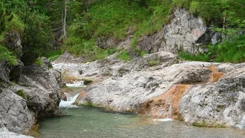 Mountain river with beautiful rocks, clear water and green plants Stock-Footage 210527854