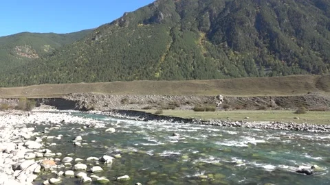 Mountain river between sheer cliffs . blue clear water of the river. Stock Footage 145179927
