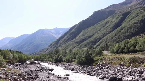 Mountain river big rocks and beautiful sunny forest Stock Footage 118251894