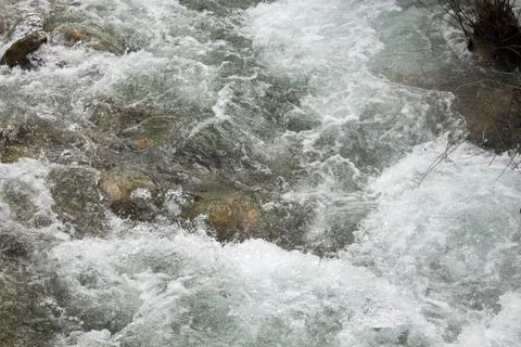 Mountain river. Bubbling mountain river. Stock Photos
