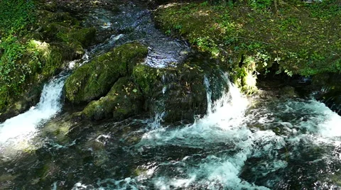 Mountain river cascades Slow motion Stock Footage 52448243