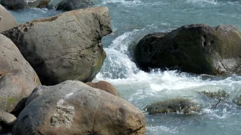 Mountain river cascades through rocks Stock-Footage 336795775