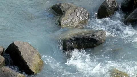 Mountain river cascades through rocks Stock Footage 336795781