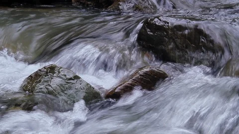 The mountain river Cibitka flows through the stones at the Red Gate. Russia, Gor Stock Footage 92462102