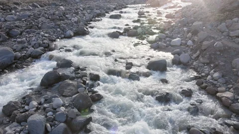 Mountain river close up aerial view with the splashes of the water Stock Footage 155690413