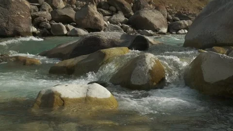 Mountain river close-up, running over rocks, slow motion Stock Footage 171639898