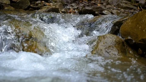 Mountain river close up slow motion Stock Footage 79290914