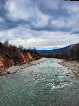 Mountain river on a cloudy day Fotos Stock