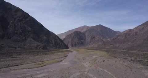 Mountain River Dance: A Drone's Aerial Ballet Along the Rapids Stock Footage 274364315