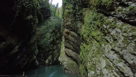 Mountain river in a dark gorge Stock Footage 164582428