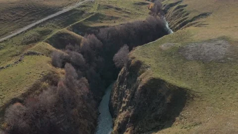 Mountain river in a deep gorge, view from a drone Stock Footage 150569207