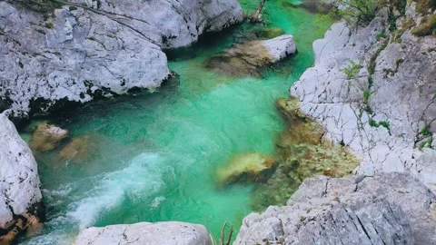 Mountain river flowing between rocks aerial view Video stock 327550711