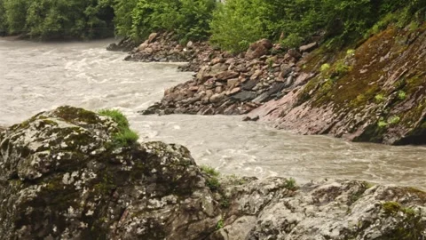 Mountain river flowing in a canyon in springtime Stock Footage 243749935