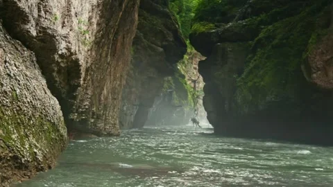 Mountain river flowing in a canyon in springtime Stock Footage 243750697