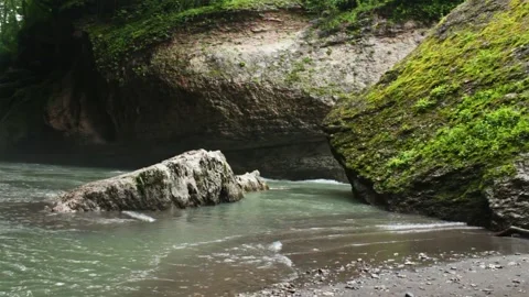 Mountain river flowing in a canyon in springtime Stock Footage 243751349