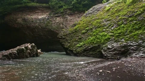 Mountain river flowing in a canyon in springtime Stock Footage 243751404