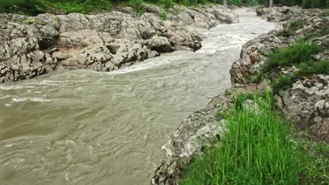 Mountain river flowing in a canyon in springtime Stock Footage 243751756