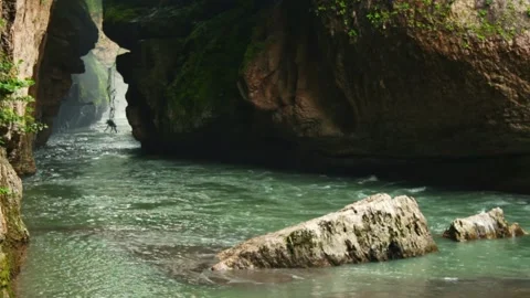 Mountain river flowing in a canyon in springtime Stock Footage 243757665