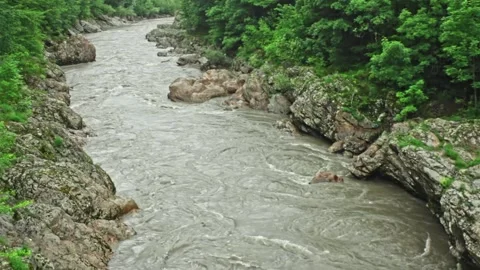 Mountain river flowing in a canyon in springtime Stock-Footage 243760112
