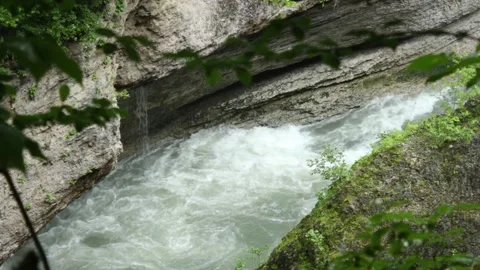 Mountain river flowing in a canyon in springtime Stock-Footage 243765197