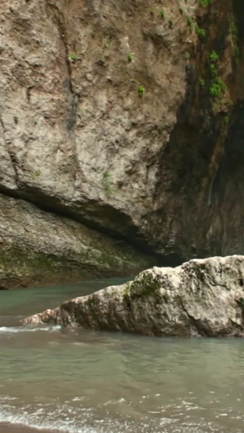 Mountain river flowing in a canyon in springtime Video stock 244064645