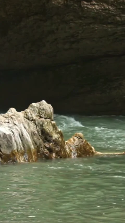 Mountain river flowing in a canyon in springtime Video stock 244064699