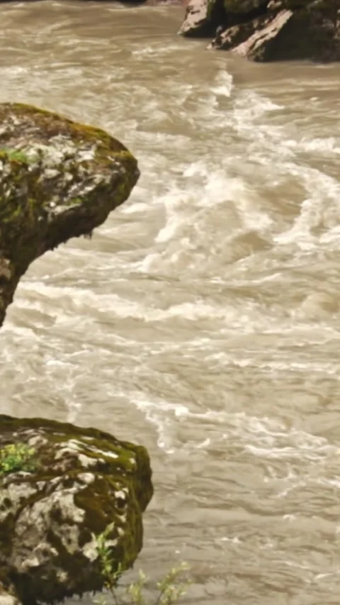 Mountain river flowing in a canyon in springtime Stock Footage 244071567