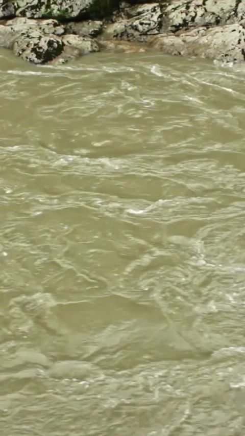 Mountain river flowing in a canyon in springtime Stockbeeldmateriaal 244073306