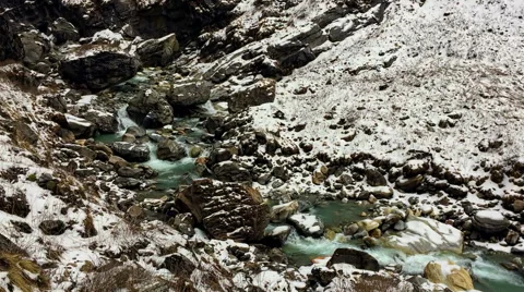 Mountain river flowing Himalayas Nepal. Water in rocks. Snow fog nature hd video Stock Footage 64829112