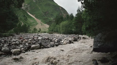 Mountain river flowing over rocks Stock Footage 68581225