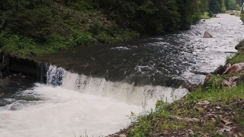 Mountain river flowing through the green forest Stock Footage 126605351