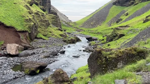 Mountain River Flowing Through Icelandic Valley Stock Footage 312410561