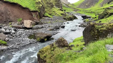 Mountain River Flowing Through Icelandic Valley vol.2 Stock Footage 312410562