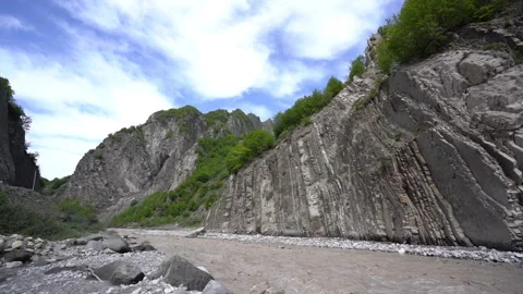 Mountain River Flowing Through Rocky Valley. Slow Motion Video stock 308962684