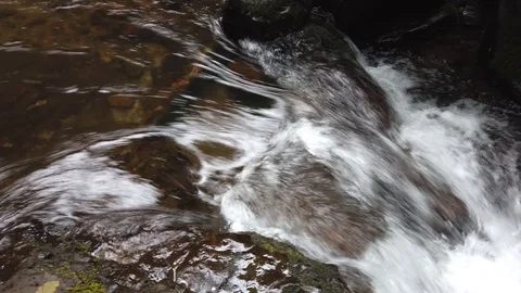 Mountain river flowing from the waterfall Stock Footage 110594494