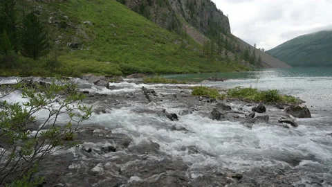 The mountain river flows among the rocks. Stock Footage 159159969