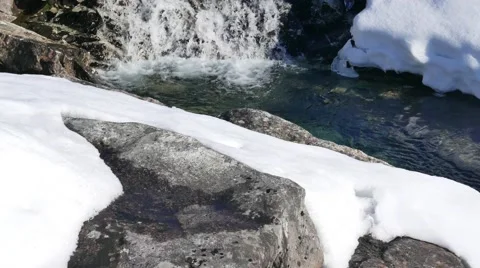 The mountain river flows down the cliff. Stock Footage 62479727