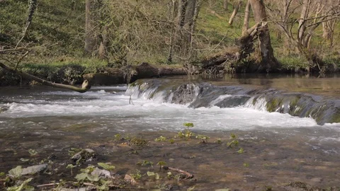 The mountain river flows over the threshold Stock Footage 106777211