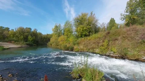 The mountain river flows into the plain Stock Footage 161447807