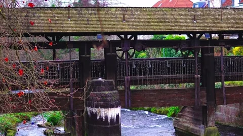 A mountain river flows through the city Stock Footage 299023195