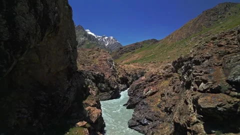Mountain river flows through rocks Stock Footage 278125043
