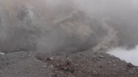 Mountain river flows in volcano crater Stock Footage 263642912