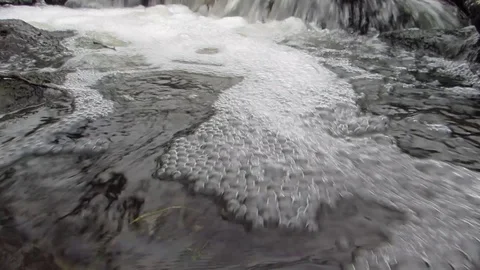 MOUNTAIN RIVER FOAM FLOW IN AUTUMN Stock Footage 129086658